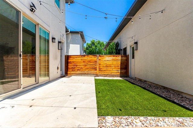 3586 S Ogden St, Englewood, CO 80113 - view of yard featuring a patio area