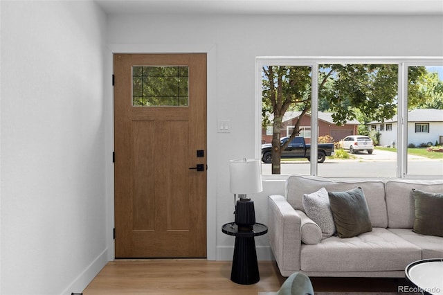 3036 Wolff St S, Denver, CO 80236 - entrance foyer featuring wood finished floors and baseboards