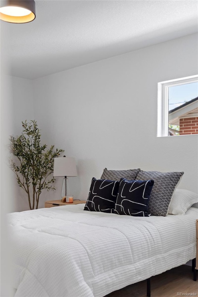 3036 Wolff St S, Denver, CO 80236 - bedroom featuring wood finished floors