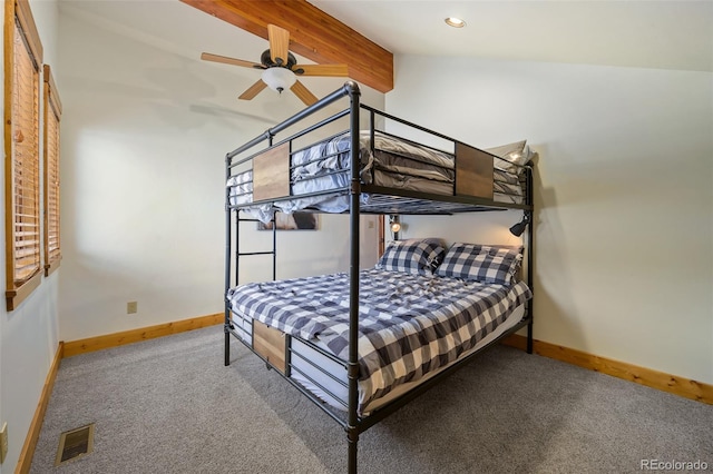 bedroom featuring lofted ceiling with beams, carpet, visible vents, and baseboards