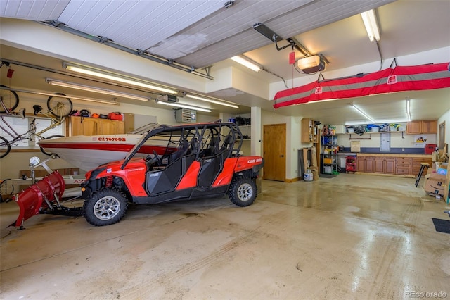 garage featuring a garage door opener