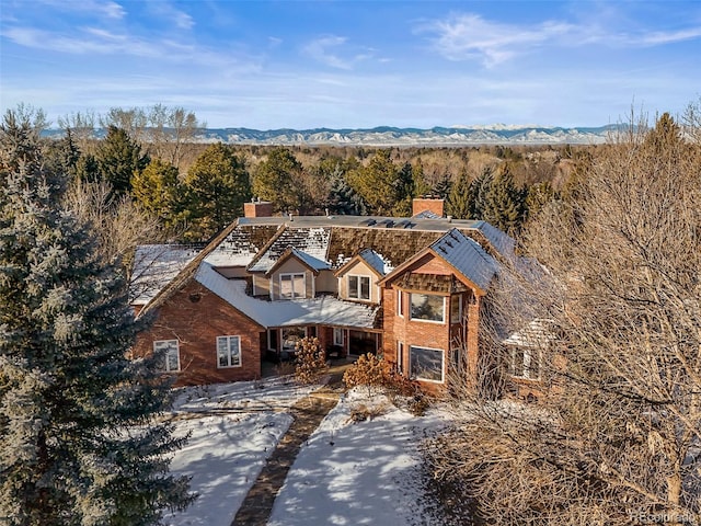 view of front of house featuring a mountain view