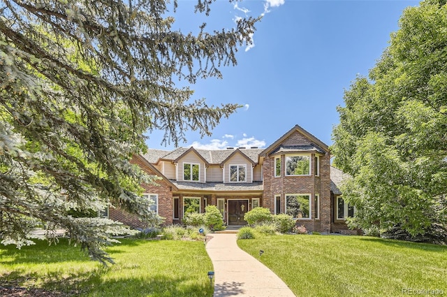 4681 S Columbine Ct, Cherry Hills Village, CO 80113 - view of front of house with brick siding and a front yard