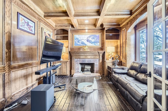 4681 S Columbine Ct, Cherry Hills Village, CO 80113 - living area with a wooden ceiling with exposed beams, wood walls, ornamental molding, dark wood finished floors, and a brick fireplace