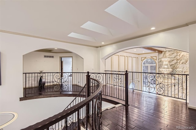 4681 S Columbine Ct, Cherry Hills Village, CO 80113 - hallway with an upstairs landing, wood finished floors, a skylight, and recessed lighting