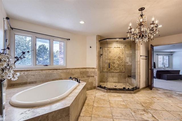 4681 S Columbine Ct, Cherry Hills Village, CO 80113 - bathroom with a garden tub, a stall shower, a chandelier, recessed lighting, and stone tile flooring