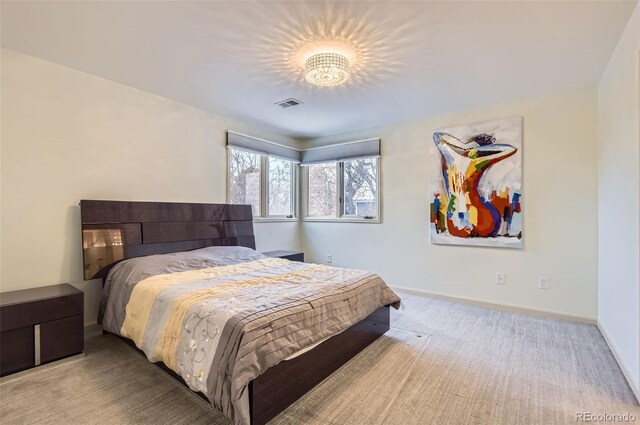 4681 S Columbine Ct, Cherry Hills Village, CO 80113 - carpeted bedroom featuring baseboards and a chandelier