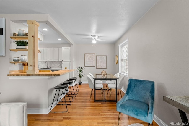 2867 Jasmine St, Denver, CO 80207 - dining area with a ceiling fan, light wood-style flooring, and recessed lighting
