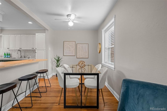 2867 Jasmine St, Denver, CO 80207 - dining room with ceiling fan, light wood-style floors, and recessed lighting