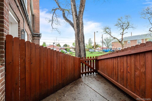 2867 Jasmine St, Denver, CO 80207 - view of patio / terrace featuring a residential view and a gate