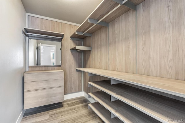 walk in closet featuring light wood-type flooring