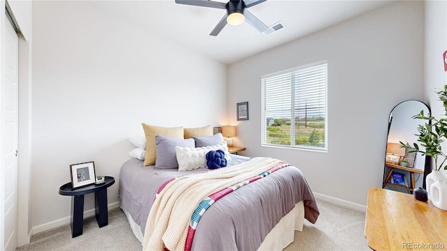 4585 High Mesa Cir, Castle Rock, CO 80108 - bedroom featuring light colored carpet, baseboards, and a ceiling fan