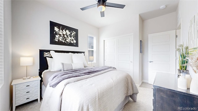 4585 High Mesa Cir, Castle Rock, CO 80108 - bedroom featuring light colored carpet, a closet, baseboards, and a ceiling fan