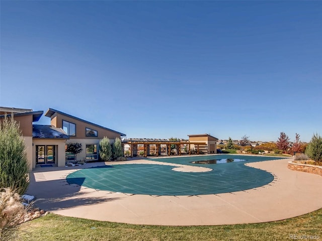 4585 High Mesa Cir, Castle Rock, CO 80108 - view of swimming pool with a patio area and a covered pool