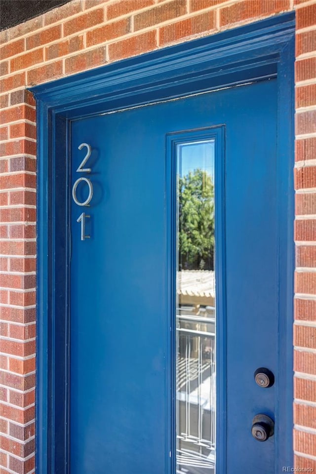 1 N Pearl St Unit 201, Denver, CO 80203 - entrance to property featuring brick siding