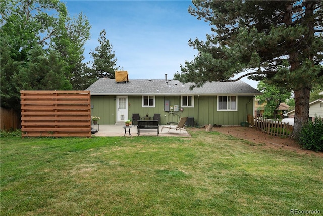 11805 W 74th Ave, Arvada, CO 80005 - rear view of property with a patio area, board and batten siding, and roof with shingles