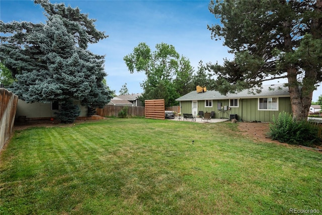 11805 W 74th Ave, Arvada, CO 80005 - fenced backyard with a patio area