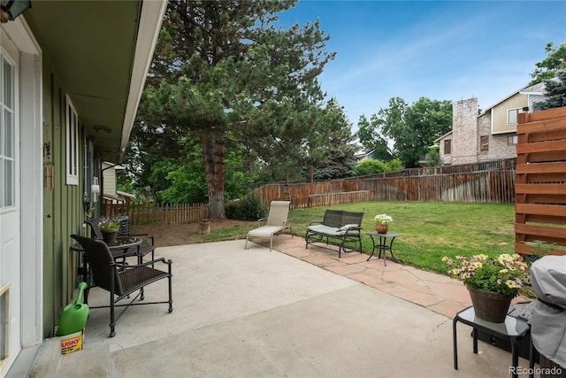 11805 W 74th Ave, Arvada, CO 80005 - fenced backyard featuring a patio