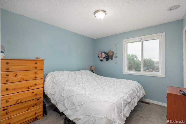 11805 W 74th Ave, Arvada, CO 80005 - carpeted bedroom featuring baseboards