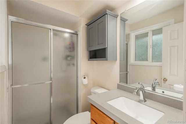 11805 W 74th Ave, Arvada, CO 80005 - bathroom featuring vanity and a shower stall