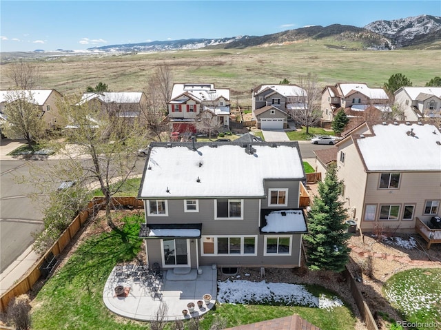 aerial view with a mountain view and a residential view
