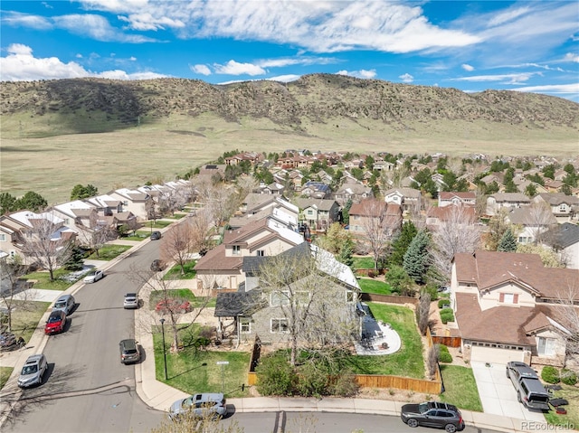 aerial view with a mountain view and a residential view