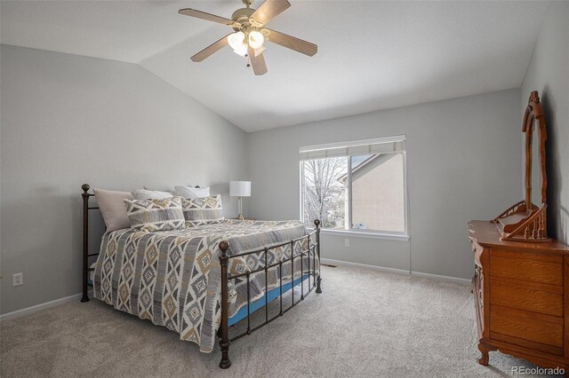 9407 W Gibraltar Pl, Littleton, CO 80127 - carpeted bedroom featuring lofted ceiling and a ceiling fan