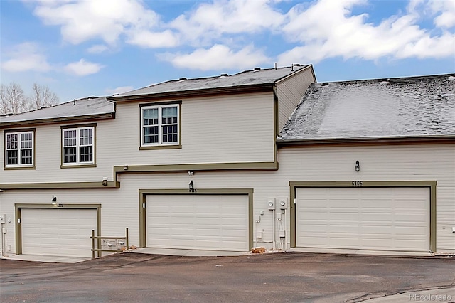 exterior space with a garage