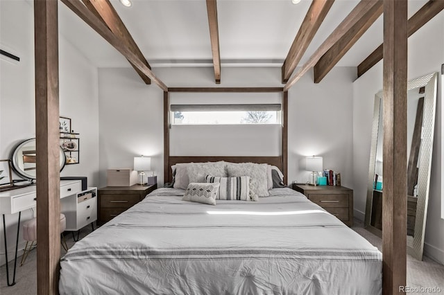 bedroom featuring beamed ceiling