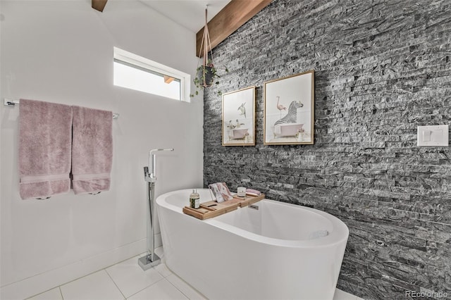 bathroom featuring tile patterned floors and a bathing tub