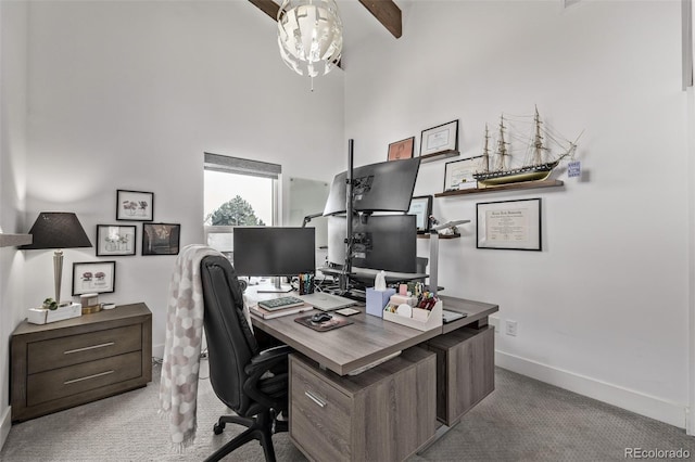 carpeted office featuring beamed ceiling, a chandelier, and a high ceiling