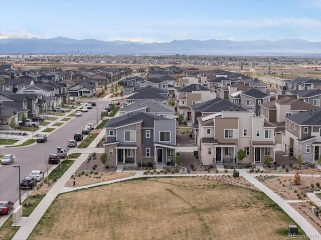 drone / aerial view with a residential view and a mountain view