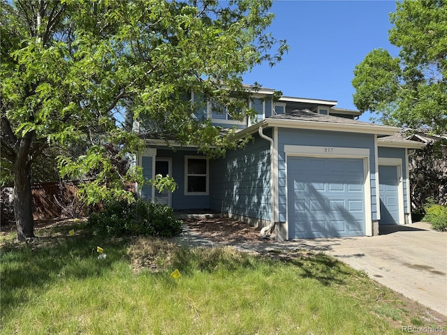 897 Mockingbird Ln, Brighton, CO 80601 - obstructed view of property with a garage and concrete driveway