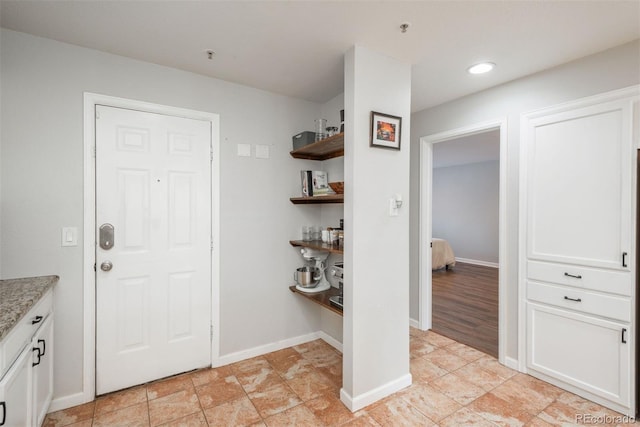 12281 E Tennessee Dr Unit 303, Aurora, CO 80012 - entrance foyer featuring baseboards and recessed lighting
