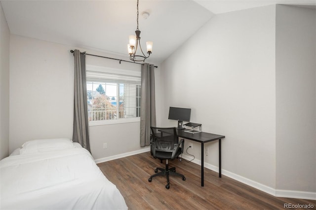 12281 E Tennessee Dr Unit 303, Aurora, CO 80012 - bedroom featuring a chandelier, lofted ceiling, wood finished floors, and a desk