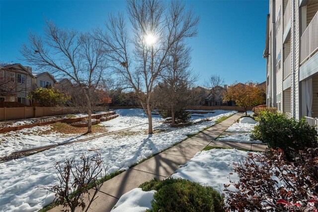 12281 E Tennessee Dr Unit 303, Aurora, CO 80012 - snowy yard featuring a residential view