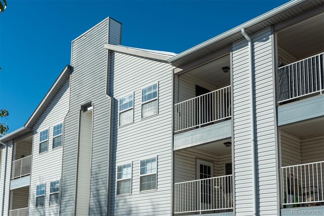 12281 E Tennessee Dr Unit 303, Aurora, CO 80012 - view of side of property with a balcony