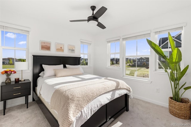 1678 Wright Aly, Erie, CO 80516 - bedroom with light colored carpet, baseboards, and a ceiling fan