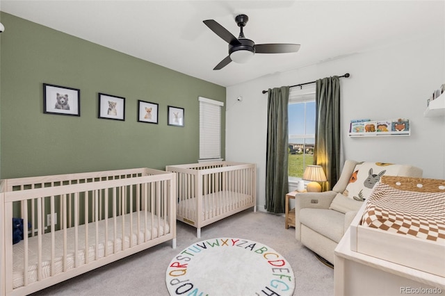 1678 Wright Aly, Erie, CO 80516 - bedroom featuring carpet flooring, a nursery area, and a ceiling fan