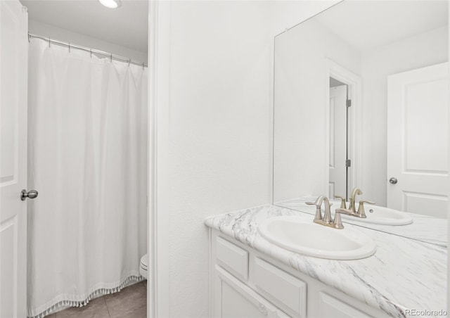 1678 Wright Aly, Erie, CO 80516 - full bath with vanity, tile patterned floors, and toilet