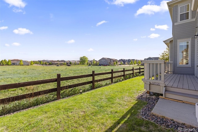 1678 Wright Aly, Erie, CO 80516 - view of yard featuring a deck and a residential view