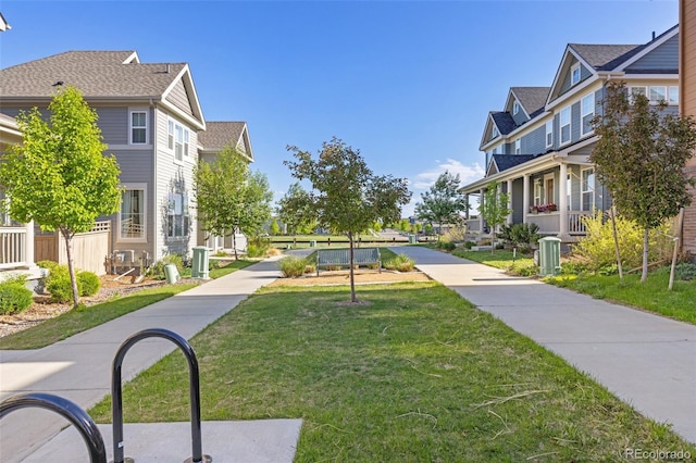1678 Wright Aly, Erie, CO 80516 - surrounding community featuring a residential view and a yard