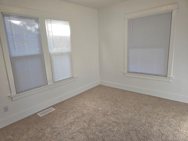 view of carpeted spare room