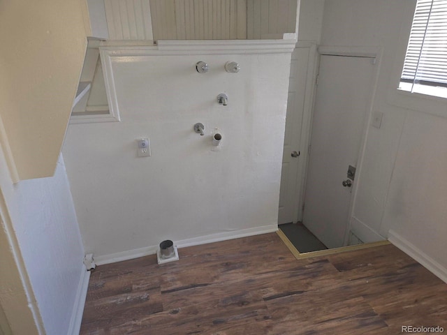 1964 Galena St, Aurora, CO 80010 - washroom featuring wood finished floors and hookup for a gas dryer