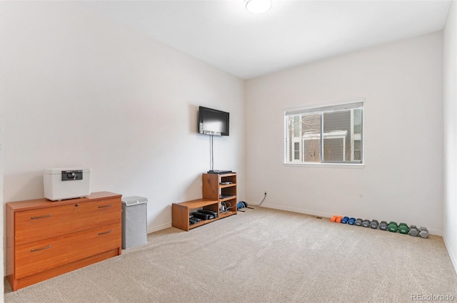 interior space featuring light colored carpet