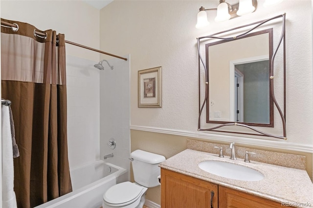 full bathroom with vanity, toilet, and shower / bath combo with shower curtain