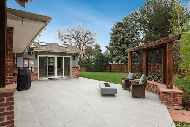 5164 E Princeton Ave, Cherry Hills Village, CO 80113 - view of patio / terrace featuring a fenced backyard, a grill, a fire pit, and french doors