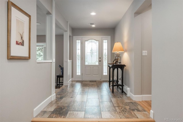5164 E Princeton Ave, Cherry Hills Village, CO 80113 - entryway with plenty of natural light, baseboards, and visible vents