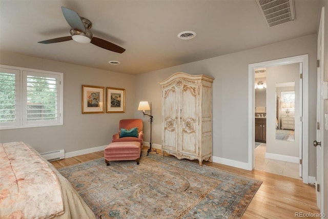 5164 E Princeton Ave, Cherry Hills Village, CO 80113 - bedroom with multiple windows, baseboard heating, and visible vents