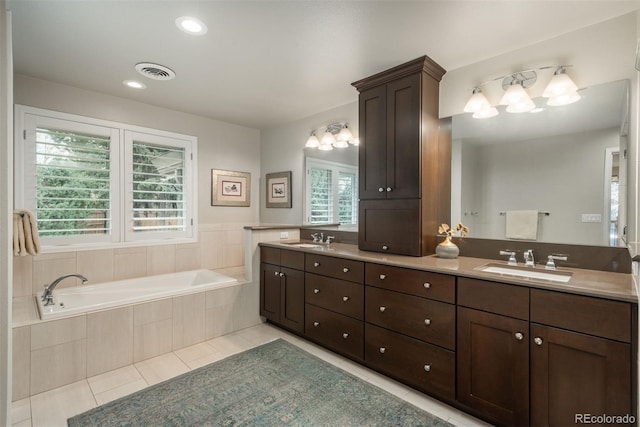 5164 E Princeton Ave, Cherry Hills Village, CO 80113 - full bath with a sink, tile patterned floors, a bath, and visible vents